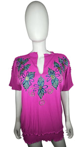This Vintage Color Creations 80's-90's hand painted floral cotton shirt is fuchsia and full of personality. Measured Flat Chest - 40" Length - 26".