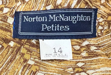 Load image into Gallery viewer, A vintage Norton McNaughton Petites 2-Piece Set with a abstract safari inspired button up short sleeve and skirt. Measured Flat TopChest - 40&quot;Sleeve - 10&quot;Length - 27&quot; Bottom Waist - 30&quot;Hips - 60&quot; Length - 30&quot;