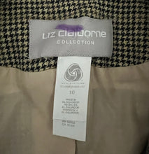 Load image into Gallery viewer, A unique throwback Liz Claiborne collection featuring a luxurious wool tweed suit adorned with houndstooth pattern. This suit comes with a blazer and pants set, with measurements of blazer chest at 30 inches, sleeve at 23 inches, and length at 29.5 inc...