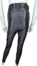 Load image into Gallery viewer, This American Apparel legging pant is a rare gem - shiny, black, and equipped with two back pockets. It may have a bit of wear on the inner upper thigh, but it&#39;s still a winner. The waist measures 28&quot;, the hips 32&quot;, and the inseam is 28&quot;, with a length of 39&quot;.