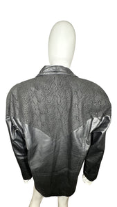 A rare stylish small black Vintage Preston & York real leather and suede jacket from the 80's with a snakeskin pattern on the suede parts. Measured FlatChest - 40"Sleeve - 22"Length - 34"