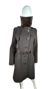 This Designer Mackage Trench Coat features a Leather Belt and is made with Wool, Cashmere, and Leather for a luxurious and stylish look. The measurements of this coat include a Flat Chest of 39 inches, Sleeve length of 24 1/2 inches, and a total Length...