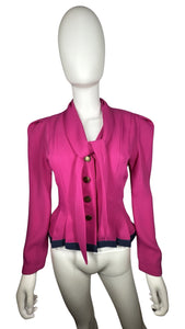 A statement blazer from Vintage Leslie Fay Petite Collections - in bold pink - rocks a sassy tie, plus a quartet of front buttons. Measurements: Chest - 34" (flat), Sleeve - 23", Length - 23".