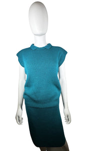 A vintage teal Silver Leaf 2 piece knitted sweater set with a small 8/10 sleeveless polo top and a medium 12/14 skirt. Measured Flat TopChest - 36"Length - 22 1/2" BottomWaist - 12-14"Hips - 38"Length - 26"