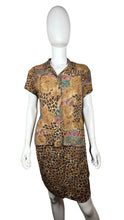 Load image into Gallery viewer, Complete your chic look with this Vintage Carole Little Petites shirt and skirt combo, featuring a stylish leopard and floral print. Easily dressed up or down, this set will fit perfectly with your top measuring 38&quot; across the chest and 5 1/2&quot; sleeves,...