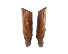 Load image into Gallery viewer, Experience the timeless beauty and quality of our Vintage Bandits Leather Boots. Handcrafted in Brazil, these stunning high boots are made with rich brown leather and designed to fit a women&#39;s size 8. Embody style and sophistication with every step you...