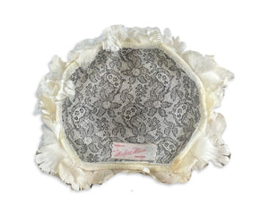 Add a touch of vintage chic to any outfit with this unique floral cream pillbox hat. The 7" diameter crown is perfect for a retro-inspired wedding or photoshoot.
