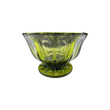 Load image into Gallery viewer, A vintage mid-century green glass pedestal footed bowl measuring at 4 inches tall and 6 inches in diameter.