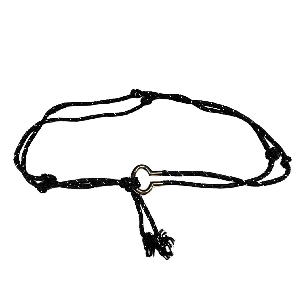 A black and white cord rope belt with gold buckle that measures at 50 inches in length.