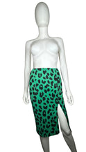 Load image into Gallery viewer, The Vintage Lush Leopard Print Skirt is a green fitted stretchy pencil skirt featuring an all-over leopard print, a front slit, and a measurement of 24&quot; waist and 30&quot; hips with a length of 23 1/2&quot;. Perfect for medium to smaller large sizes!