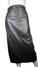 Load image into Gallery viewer, This Vintage G-III Leather Fashions Skirt boasts a high waist and stunning design. Expertly crafted, it features a waist measurement of 29 inches and a length of 30 inches, providing a flattering fit for those with 36 inch hips.