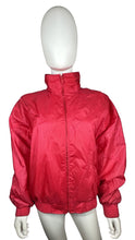 Load image into Gallery viewer, Experience the bold, vibrant red of this Vintage Metro Active wind jacket. Carefully crafted with a flat chest measurement of 42&quot;, sleeve length of 23&quot;, and overall length of 24&quot;. Don&#39;t miss out on this unique piece that combines fashion and function.