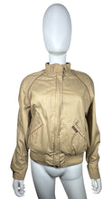 Load image into Gallery viewer, This Vintage Members Only Jacket comes in a beautiful tan and brown color and features a reversible zip-up design with two buttons. Measured Flat Chest - 32&quot; Sleeve - 24&quot; Length - 24&quot;.