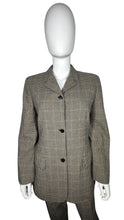 Load image into Gallery viewer, A unique throwback Liz Claiborne collection featuring a luxurious wool tweed suit adorned with houndstooth pattern. This suit comes with a blazer and pants set, with measurements of blazer chest at 30 inches, sleeve at 23 inches, and length at 29.5 inc...