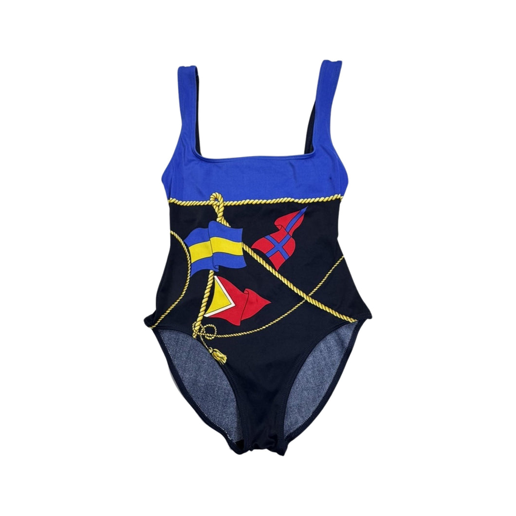 Get ready to make a splash with this Vintage Adrienne Vittadini nautical blue one piece high cut swimsuit! Its square top adds a touch of uniqueness, while the measurements of a 22