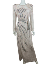 Load image into Gallery viewer, This stunning dress is a one-of-a-kind gem from the 80&#39;s, embellished with shiny beads and a delicate, blush pink color. The stylish, form-fitting shape is highlighted by a dazzling, bedazzled belt. Measurements: Bust - 30&quot; Sleeves - 23 1/2&quot; Length - 5...