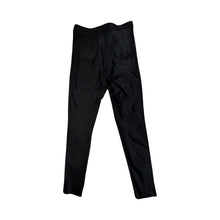 Load image into Gallery viewer, This American Apparel legging pant is a rare gem - shiny, black, and equipped with two back pockets. It may have a bit of wear on the inner upper thigh, but it&#39;s still a winner. The waist measures 28&quot;, the hips 32&quot;, and the inseam is 28&quot;, with a length of 39&quot;.