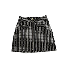 Load image into Gallery viewer, This Express skirt comes in a size 2 and features a fun black and white pattern with a bold gold zipper in the front. When laid flat, it measures 26&quot; at the waist, 36&quot; at the hips, and has a length of 24&quot;.