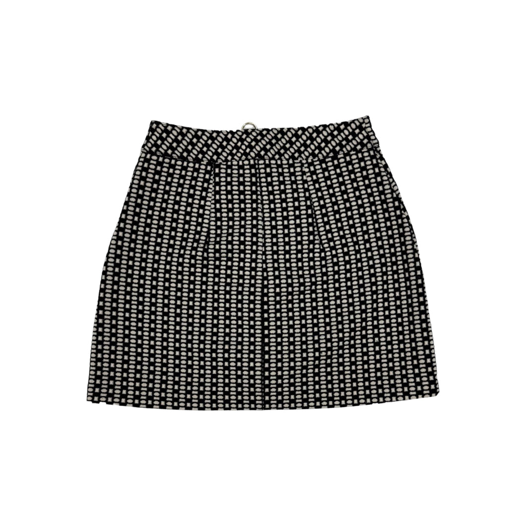 This Express skirt comes in a size 2 and features a fun black and white pattern with a bold gold zipper in the front. When laid flat, it measures 26