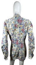 Load image into Gallery viewer, Step into spring with this Vintage 90&#39;s Paris Blues Denim Floral Jacket - a beautifully decorated cargo-pocketed button-up with a lovely pastel floral pattern. Chest size: 37&quot; Sleeve length: 24 1/2&quot; Total length: 32&quot;