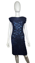 Load image into Gallery viewer, This Vintage Blue Sequin Dress is truly stunning with its captivating sequins, chic pencil silhouette, and alluring scoop back. Zipping up on the side, it fits seamlessly on the body, measuring at 29&quot; for the chest, 26&quot; for the waist, and 28&quot; for the h...