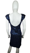 Load image into Gallery viewer, This Vintage Blue Sequin Dress is truly stunning with its captivating sequins, chic pencil silhouette, and alluring scoop back. Zipping up on the side, it fits seamlessly on the body, measuring at 29&quot; for the chest, 26&quot; for the waist, and 28&quot; for the h...