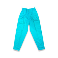 Load image into Gallery viewer, The Vintage Liz Wear Teal Pant is a rare and delightful find, boasting a vibrant color and a playful 3-button design. With a zipper closure, this pant is both fun and functional. It measures a flat waist of 24 inches, with hips of 42 inches, and an ins...