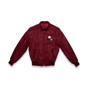 The Vintage Members Only Maroon Jacket is a zip up two button collar maroon members only jacket.     Measured Flat  Chest - 41"  Sleeve - 24"  Length - 25"