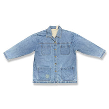 Load image into Gallery viewer, Keep it casual and cool in this Cabin Creek Oversized denim jacket. It may have a little &quot;character&quot; stain on the front right pocket, but it only adds to the charm. Measured at a flat 50&quot; chest and a length of 31 1/4&quot;, this is the perfect piece for a r...