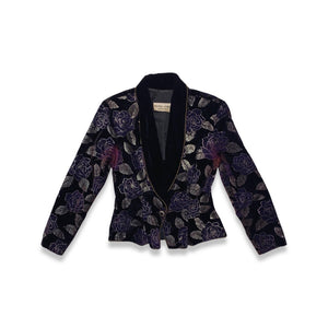 Vintage Velvet Dark Purple Blazer has some wear from the material rubbing under the arms.   Measured Flat   Chest - 30"  Sleeve - 23"  Length - 26"