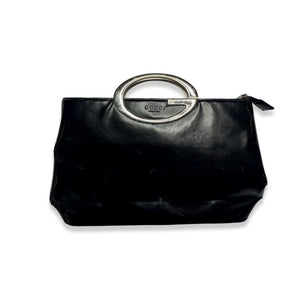 Experience the timeless glamour of our Vintage Faux Gucci Clutch, featuring a sleek black finish and a luxurious silver handle.
