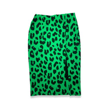 Load image into Gallery viewer, Vintage Lush Leopard Print Skirt is a green fitted stretchy pencil skirt with all over leopard print and slit in front.  Can fit from medium to a smaller large   Measured Flat   Waist - 24&quot;  Hips - 30&quot;  Length - ﻿23 1/2&quot;   