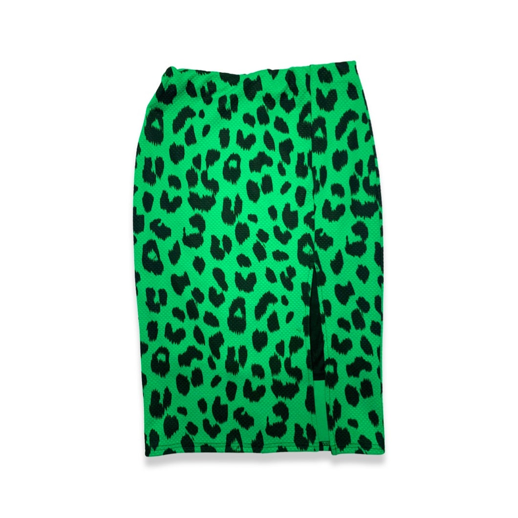 Vintage Lush Leopard Print Skirt is a green fitted stretchy pencil skirt with all over leopard print and slit in front.  Can fit from medium to a smaller large   Measured Flat   Waist - 24