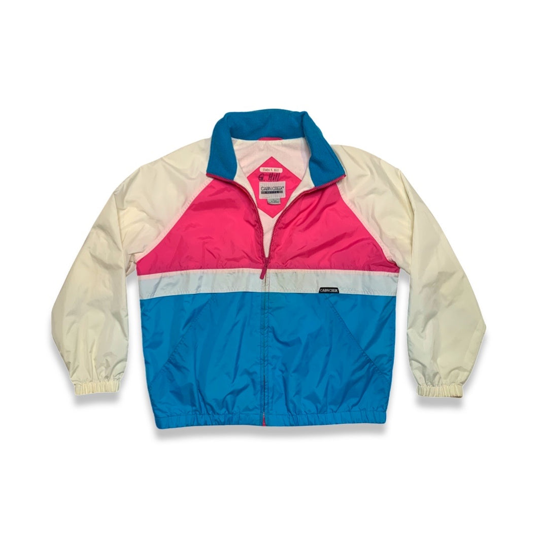 This vintage windbreaker jacket from Cabin Creek Petite is a playful pop of color with a phantom hood for rainy days. With a chest measurement of 45 inches, sleeve length of 28 inches, and a length of 26.5 inches, it's perfect for adding some fun to yo...