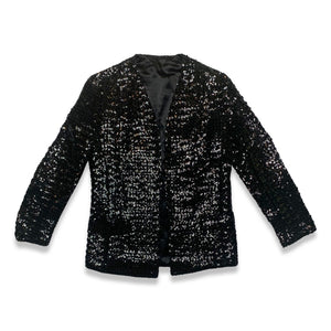 Experience the dazzling beauty of our Vintage ILGWU Sequin Blazer, crafted by the renowned International Ladies Garment Workers Union. This stunning black blazer features measurements of 34" chest, 23" sleeves, and 27" length in size 11, and 33" chest,...