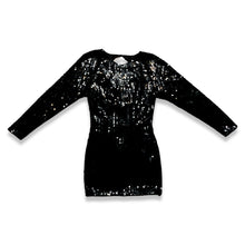 Load image into Gallery viewer, Experience the irresistible glamour of the Vintage Maison Magique Sequin Dress. This stunning black cocktail dress features long sleeves and a mini length, all adorned with sparkling sequins. With a flat chest measurement of 31 inches, sleeve length of...