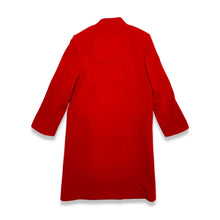 Load image into Gallery viewer, The Vintage KronHaus Coat is a luxurious, bespoke red wool coat. Its unique vintage charm is further enhanced by subtle imperfections near the button zipper area, as shown in the picture. 